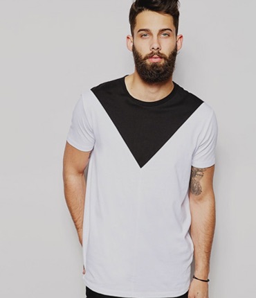 Man with Beard Wearing White Shirt With Black Triangle Collar