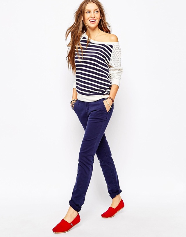 Girl with Off-Shoulder Striped Top, Blue Pants and Red Toms